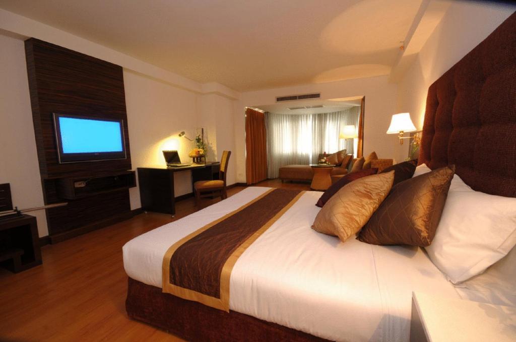 Furama Chiang Mai Hotel Quarto foto